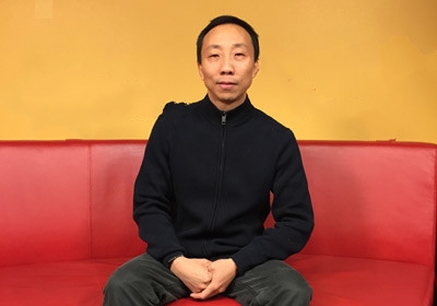 行走于文人和江湖之间的“地产老兵”沈力男