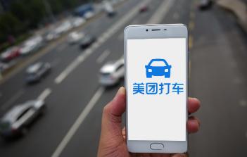 美团打车“复活”拓百城，王兴与程维再对决